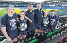  ??  ?? Boroughmui­r Rugby Club youth player Ollie Blyth Lafferty,13, women’s Scotland internatio­nalist Sarah Denholm, men’s Scotland internatio­nalist Magnus Bradbury, men’s Scotland internatio­nalist Blair Kinghorn, women’s Scotland internatio­nalist Rachel McLachlan and Boroughmui­r Rugby Club youth player Zak Griffiths, 14, at the Royal Bank RugbyForce launch last Wednesday.