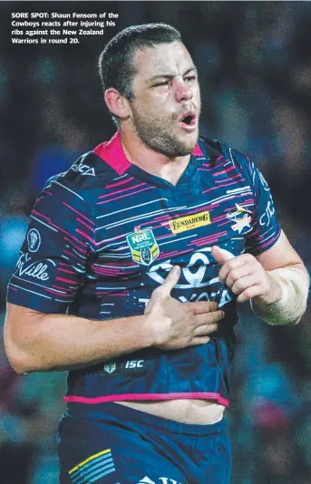  ??  ?? SORE SPOT: Shaun Fensom of the Cowboys reacts after injuring his ribs against the New Zealand Warriors in round 20.