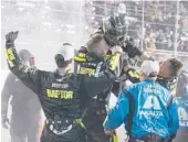  ?? STEVE HELBER/AP ?? William Byron celebrates with his pit crew Saturday after winning his second NASCAR Cup race of the year. Byron holds a 30-point lead in the standings.