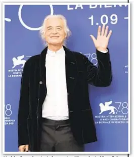  ??  ?? Musician Jimmy Page touts documentar­y “‘Becoming Led Zeppelin” on Saturday at the Venice Film Festival. Top, the band in 1973, from left, John Paul Jones, John Bonham, Page and Robert Plant.