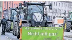  ?? FOTO: MARTIN SCHUTT/DPA ?? Der Konflikt um Diesel-Vergünstig­ungen für Landwirte hat jüngst die Eröffnung der Agrarmesse Grüne Woche in Berlin überschatt­et.