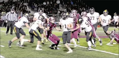  ?? MARK HUMPHREY ENTERPRISE-LEADER ?? Prairie Grove sophomore Cade Grant (No. 1) breaks a 45-yard touchdown run that helped the Tigers surge ahead, 28-20, in the second quarter Friday. Lincoln rallied in the second half and won 59-48 to break a 19-game losing streak to the Tigers.