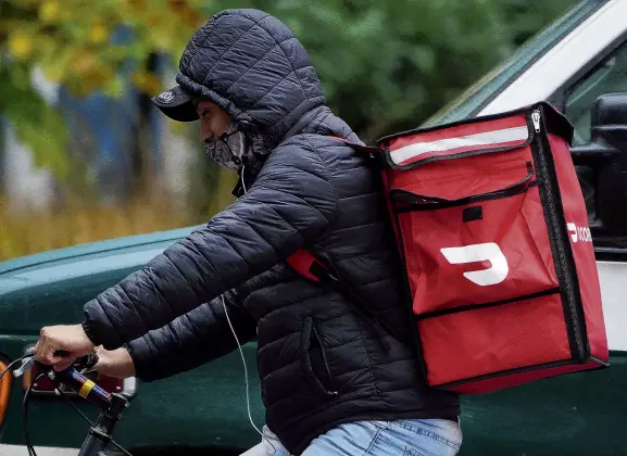  ?? PHOTO: REUTERS ?? Fastmoving market . . . American food delivery firm DoorDash expanded into New Zealand in June.