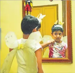  ?? ABHINAV SAHA/HT ?? (Right) Aarnav Arora Singhal, 5, from Delhi picked out a Frozen T-shirt, fairy princess hotpants, a butterfly headband and white angel wings to wear for his shoot. He also likes earrings, stoles and flowers in his hair.