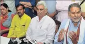  ?? MANOJ DHAKA/HT ?? Haryana education minister Ram Bilas Sharma (R) addressing a press conference in Rohtak on Saturday as cooperatio­n minister Manish Grover (2R) looks on.