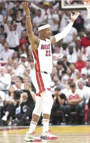  ?? FRANCE PRESSE AGENCE ?? Jimmy Butler #22 of the Miami Heat celebrates against the Philadelph­ia 76ers during the second half in Game Five of the Eastern Conference Semifinals at FTX Arena in Miami, Florida.