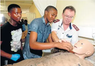  ?? /Fredlin Adriaan ?? Big changes: Dr Herman Willemse trains male nursing students Vuyolwethu Mompante, left, and Sihle Mkentana at Missionval­e Campus. Training for new nursing qualificat­ions starts in January.