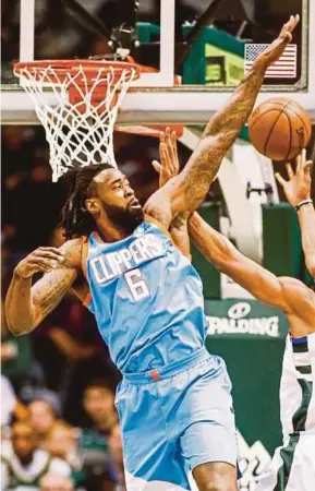  ?? EPA PIC ?? Los Angeles Clippers’ DeAndre Jordan blocks a shot during their NBA game against Milwaukee Bucks on Wednesday.