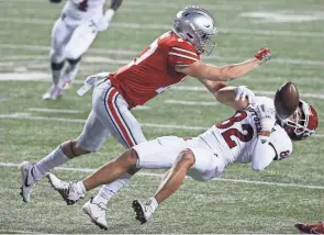  ?? JOSHUA A. BICKEL/COLUMBUS DISPATCH ?? Ohio State’s Bryson Shaw saw action in five games as a redshirt freshman in 2020, including a victory over Rutgers.