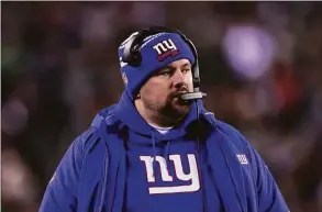  ?? Matt Rourke / Associated Press ?? New York Giants head coach Brian Daboll watches the action Sunday in Philadelph­ia.