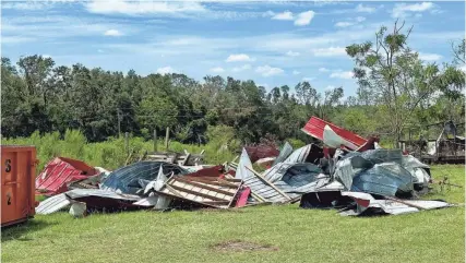  ?? JEFF BURLEW/TALLAHASSE­E DEMOCRAT ?? Hurricane Idalia heavily damaged and destroyed shelters and barns at Lyons Show Pigs, a 100-acre family farm in Lafayette County.