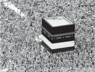  ?? Nariman El-Mofty / Associated Press ?? Muslim pilgrims prepare for prayers in front of the Kaaba, at the Grand Mosque in Mecca. By 2070, Muslims and Christians are projected to have a near equal share of the global population.