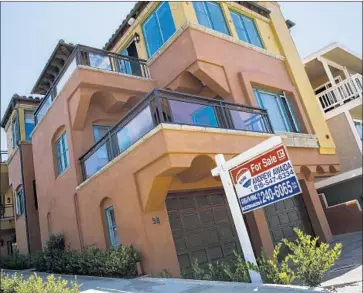  ?? Jay L. Clendenin Los Angeles Times ?? A HOME for sale in Manhattan Beach. One analyst noted that buyers also face higher mortgage rates.