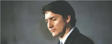  ?? COLE BURSTON / THE CANADIAN PRESS ?? Prime Minister Justin Trudeau has overwhelme­d Canada's welfare structure and housing capabiliti­es with out-of-control immigratio­n — a step that brings us closer to national suicide, writes Ron Hoffman.