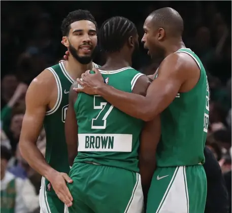  ?? ?? YOUTH MOVEMENT: Veteran Al Horford, right and at right in top right photo, said he feels motivated by the play of youngsters Jayson Tatum, left, Jaylen Brown, middle, and Marcus Smart, seen at left in top right photo.