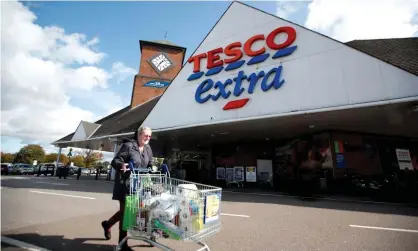  ?? Photograph: Peter Cziborra/Reuters ?? Tesco’s rates bill has risen by 80% in 10 years, says it chief executive, Ken Murphy, while sales in some stores are flat or lower.