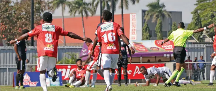  ?? Photo: Fiji FA Media ?? Rewa striker Josaia Sela (on the ground) celebrates after scoring the first goal against Ba in the Punjas Battle of the Giants semi-final at Churchill Park, Lautoka on August 15, 2020. Rewa won 8-7 on penalty kicks but Sela is going to miss today’s final after he fractured his leg.