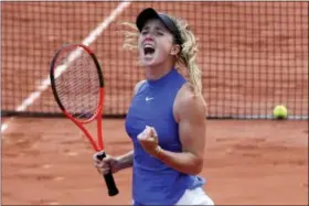  ?? CHRISTOPHE ENA — THE ASSOCIATED PRESS ?? Elina Svitolina reacts after beating Petra Martic during their fourth-round match at the French Open Monday in Paris.