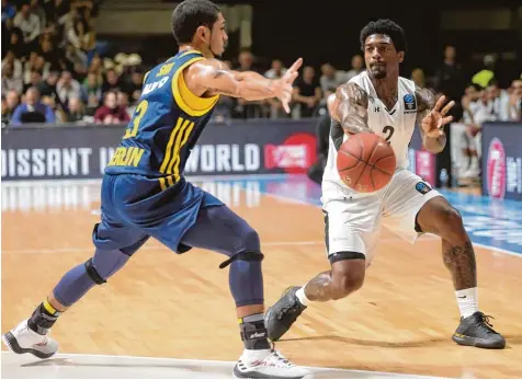  ?? Foto: Imago ?? Patrick Miller bringt reichlich Erfahrung auch auf europäisch­em Niveau mit. Unser Bild zeigt den Ulmer Neuzugang im Partizan Trikot (rechts) gegen Peyton Siva von Alba Berlin.