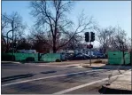  ?? MICHAEL WEBER — ENTERPRISE-RECORD ?? The entrance of Comanche Creek Greenway is seen with green opaque fencing on Thursday in Chico.