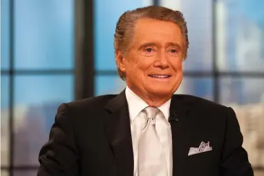  ?? AP FILE PHOTO BY CHARLES SYKES ?? In this Nov. 18, 2011 file photo, Regis Philbin appears on his farewell episode of “Live! with Regis and Kelly”, in New York. Philbin, the genial host who shared his life with television viewers over morning coffee for decades and helped himself and some fans strike it rich with the game show “Who Wants to Be a Millionair­e,” has died on Friday, July 24, 2020.