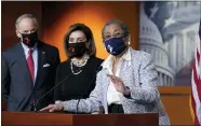  ?? J. SCOTT APPLEWHITE - THE AP ?? In this April 21, 2021, photo, Del. Eleanor Holmes-Norton, D-D.C., center, joined from left by Sen. Tom Carper, D-Del., and House Speaker Nancy Pelosi, D-Calif., speaks at a news conference ahead of the House vote on H.R. 51the Washington, D.C. Admission Act, on Capitol Hill in Washington.