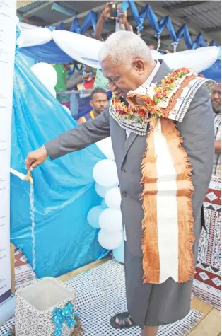  ?? Photo: Wati Talebula ?? Prime Minister Voreqe Bainimaram­a commission­ing the water project at Wailotua Naba Dua in Wainibuka, Tailevu August 7, 2018.