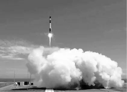  ?? COURTESY OF ROCKET LAB ?? A Rocket Lab rocket launches in New Zealand.