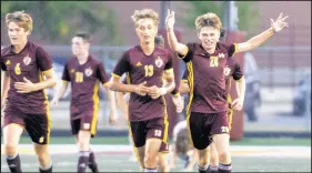  ?? /MICHAEL GARD / POST-TRIBUNE PHOTOS ?? Chesterton’s Josh Wadowski, right, celebrates his goal against visiting Valparaiso alongside teammate Nick Biel on Wednesday.