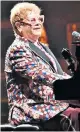  ??  ?? Over the top: that’s the USP of Elton John’s fashion style