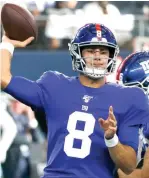  ?? Michael Ainsworth/Associated Press ?? ■ New York Giants quarterbac­k Daniel Jones) throws a pass under pressure from Dallas Cowboys defensive tackle Maliek Collins (96) on Sept. 8 in Arlington, Texas.