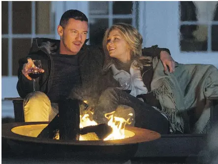  ?? UNIVERSAL PICTURES ?? Luke Evans and Haley Bennett in The Girl on the Train, to which Daniel Mallory’s debut is being compared. The Woman in the Window became an instant bestseller and is headed for Hollywood.