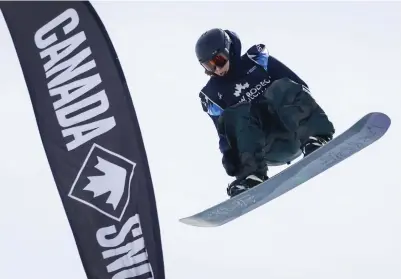  ?? JEFF MCINTOSH THE CANADIAN PRESS FILE PHOTO ?? Havelock’s Cameron Spalding competes during the men’s World Cup slopestyle snowboard event in Calgary in February 2023.