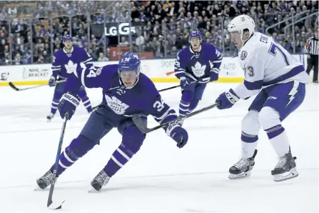  ?? MICHAEL PEAKE/POSTMEDIA NETWORK ?? Auston Matthews with the puck as the Toronto Maple Leafs play the Tampa Bay Lightning at the Air Canada Centre in Toronto on Monday.