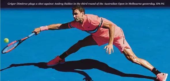  ?? EPA PIC ?? Grigor Dimitrov plays a shot against Andrey Rublev in the third round of the Australian Open in Melbourne yesterday.