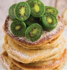  ?? CYNTHIA DAVID ?? Buttermilk Kiwiberry Pancakes make for a sweet, tangy and nutritious start to your morning. The little green baubles are low in calories and a good source of calcium, potassium, fibre and vitamin E, a powerful antioxidan­t.