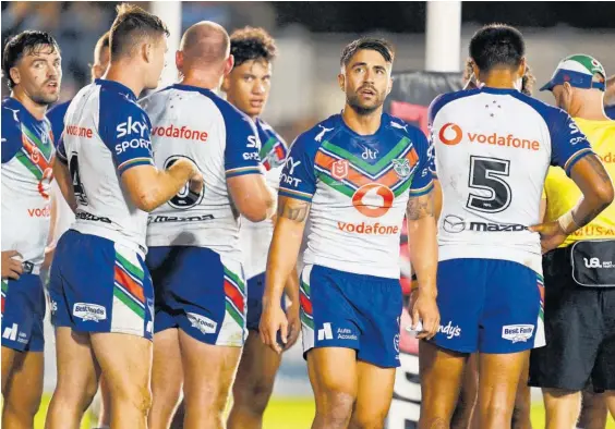  ?? Photo / Photosport ?? Senior Warriors player Shaun Johnson cut a dejected figure after the defeat to Cronulla on Sunday.