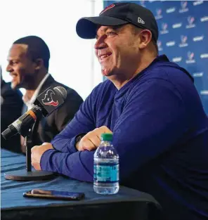  ??  ?? k Deshaun Watson, center, and general manager Rick Smith at NRG Stadium in April after the Clemson quarterbac­k. O’Brien has nothing but praise for Watson’s work ethic. Brett Coomer / Houston Chronicle