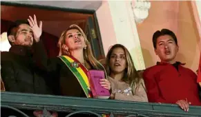  ?? — reuters ?? New chapter: anez addressing supporters from the balcony of the presidenti­al palace in La Paz.