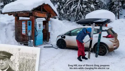  ?? TRAVIS ROUSSEAU ?? Greg Hill, star of Electric Greg, prepares his skis while charging his electric car