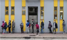  ?? Photograph: Anadolu Agency/Getty Images ?? Residents are seen queueing at a Covid testing centre as Hong Kong confirms a new daily record