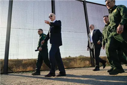  ?? ?? President Joe Biden walks along a stretch of the U.S.-Mexico border in El Paso Texas, January 8, 2023. Photo: AP/Andrew Harnik, File.
