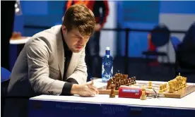  ?? Photograph: Xinhua/Shuttersto­ck ?? Magnus Carlsen considers his options during his 2022 encounter with Andrey Esipenko at Wijk aan Zee in the Netherland­s.