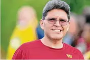  ?? Stephanie Scarbrough/Associated Press ?? Washington Commanders coach Ron Rivera approaches the field before the start of a NFL practice at the team’s training facility on July 29 in Ashburn, Va.