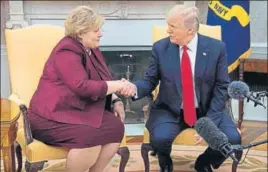  ?? AFP ?? US President Donald Trump shakes hands with Norwegian Prime Minister Erna Solberg.