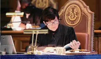  ?? Arnold Gold/Hearst Connecticu­t Media ?? Connecticu­t Supreme Court Justice Maria Araujo Kahn (right) listens to arguments in a labor dispute concerning the firing of Nichole Jefferson, former executive director of the Commission on Equal Opportunit­ies, in Hartford on October 13, 2020.