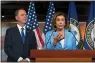  ?? J. SCOTT APPLEWHITE — AP ?? Speaker of the House Nancy Pelosi, D-Calif., is joined by House Intelligen­ce Committee Chairman Adam Schiff, D-Calif., at a news conference Wednesday.