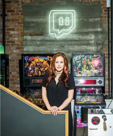  ??  ?? Anna Prosser Robinson, host and programmin­g manager for Misscliks, at headquarte­rs for Twitch in San Francisco. The gaming channel Misscliks, founded in 2013 by Robinson, a Twitch employee, and three other women, was one of the first to explicitly lay...