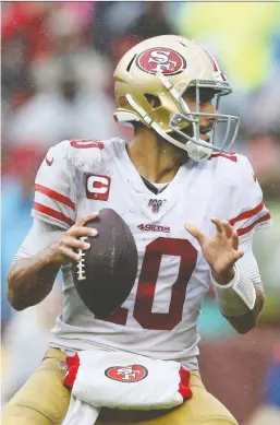  ?? ROB CARR/GETTY IMAGES ?? Jimmy Garoppolo has thrown six intercepti­ons against seven touchdowns, but the only number that counts to his teammates in San Francisco is the 49ers are 6-0 heading into this week’s game against Carolina after going 4-12 last season..