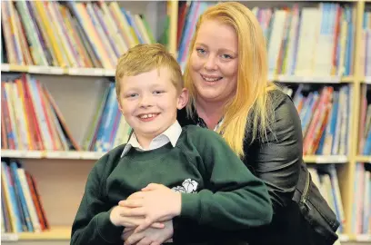  ?? Dominic Salter ?? Ewan Dingle with his proud and grateful mum Emma